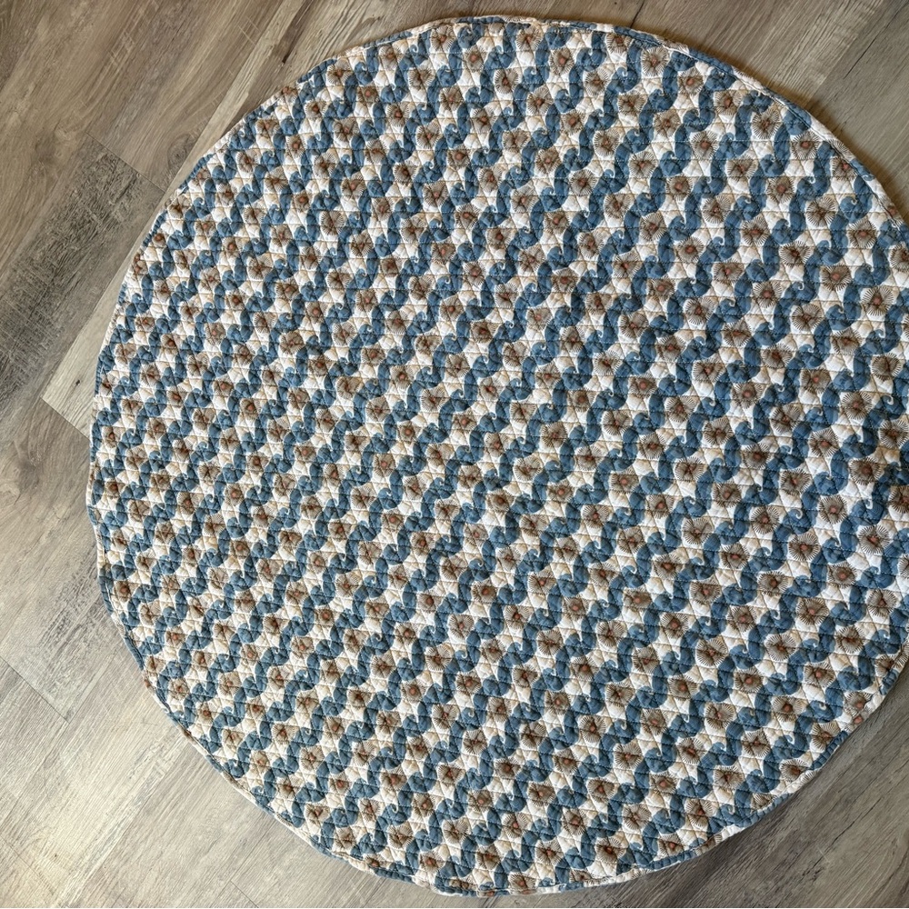 Kate Quinn Blue and Cream Braided quilt